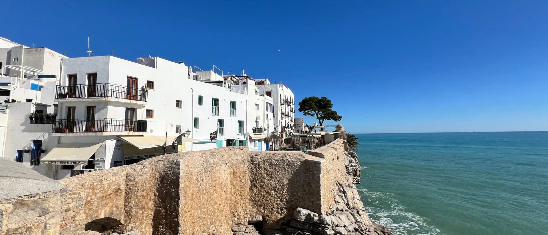 Whitewashed houses above the sea in Pe&ntilde;&iacute;scola, province of Castell&oacute;n